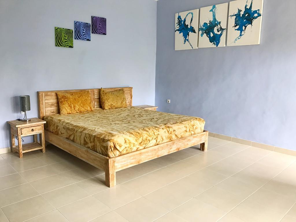 Koming Guest House Canggu Екстериор снимка