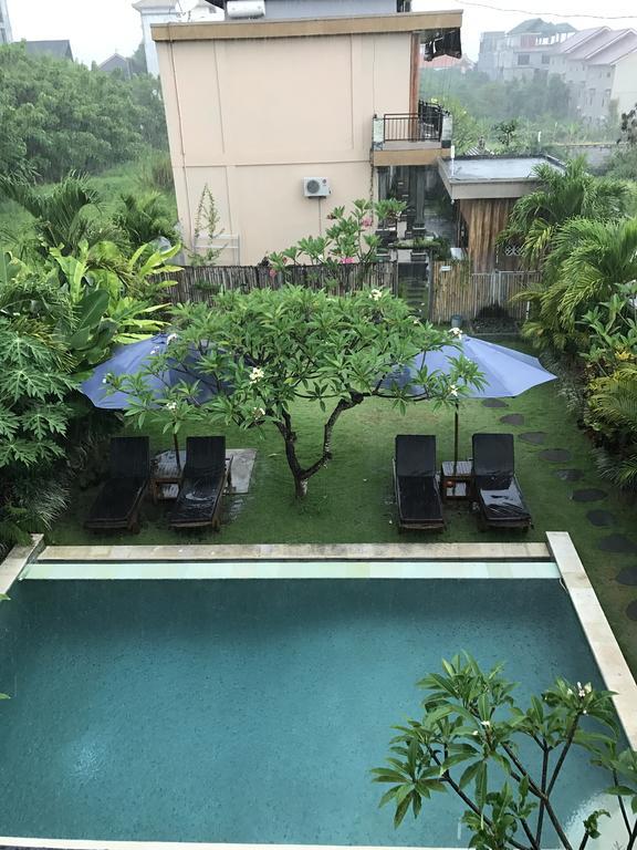 Koming Guest House Canggu Екстериор снимка