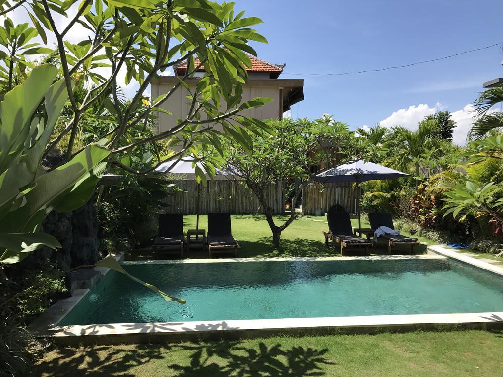 Koming Guest House Canggu Екстериор снимка