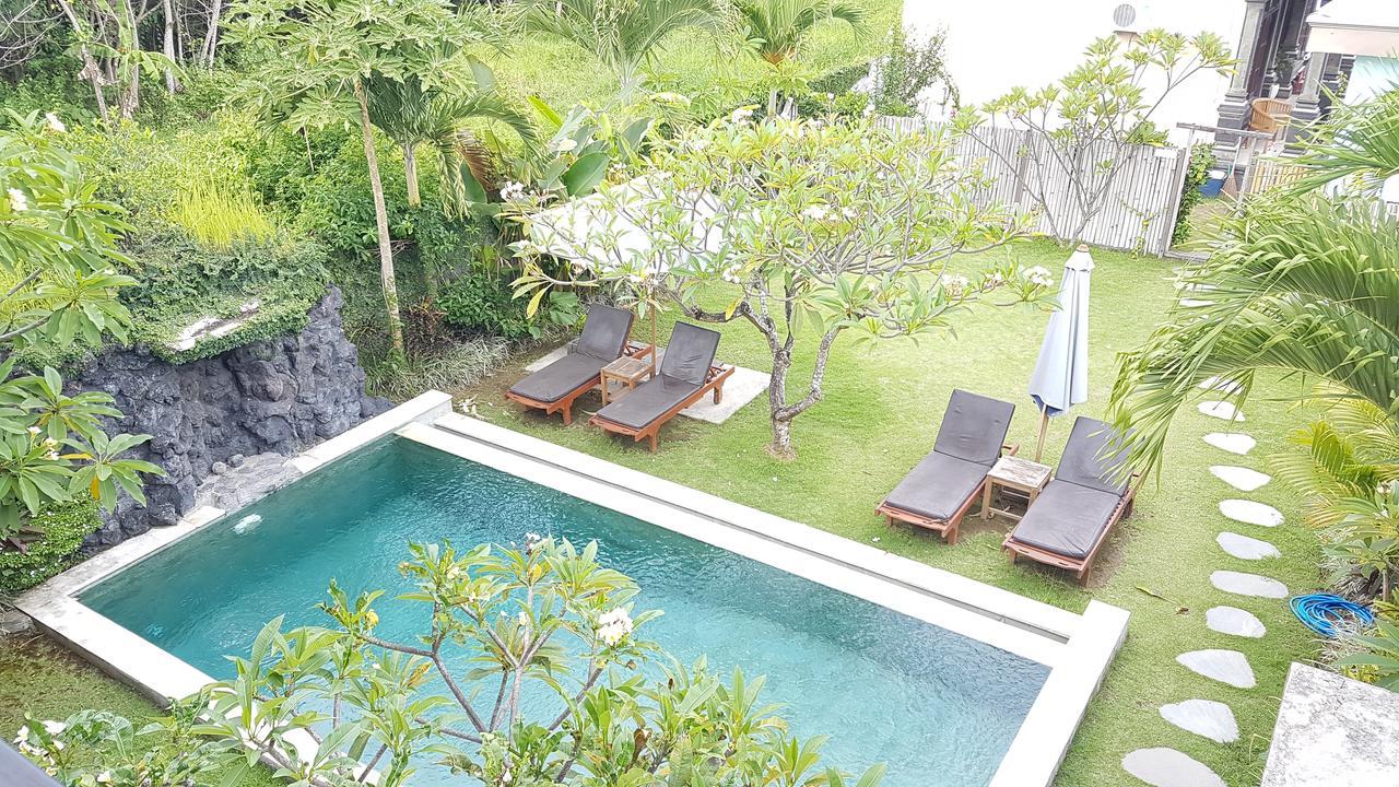 Koming Guest House Canggu Екстериор снимка