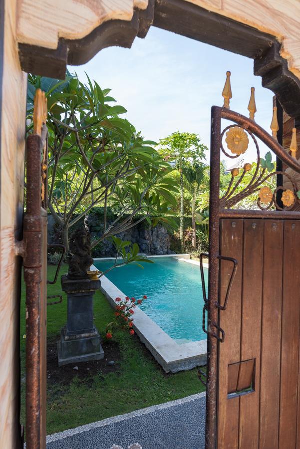 Koming Guest House Canggu Екстериор снимка