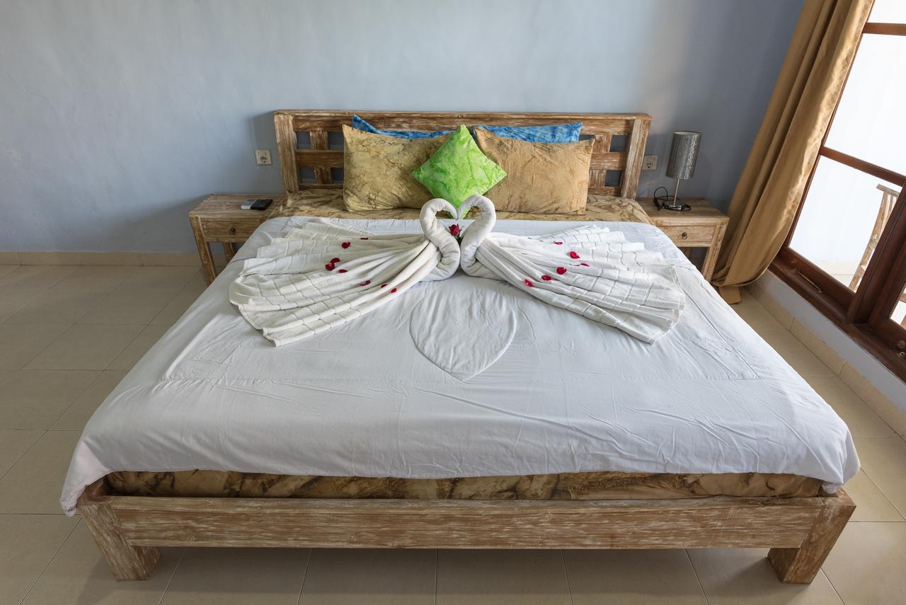 Koming Guest House Canggu Екстериор снимка