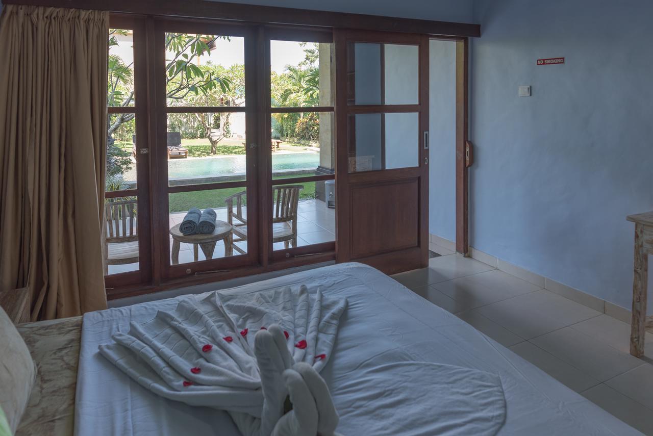 Koming Guest House Canggu Екстериор снимка